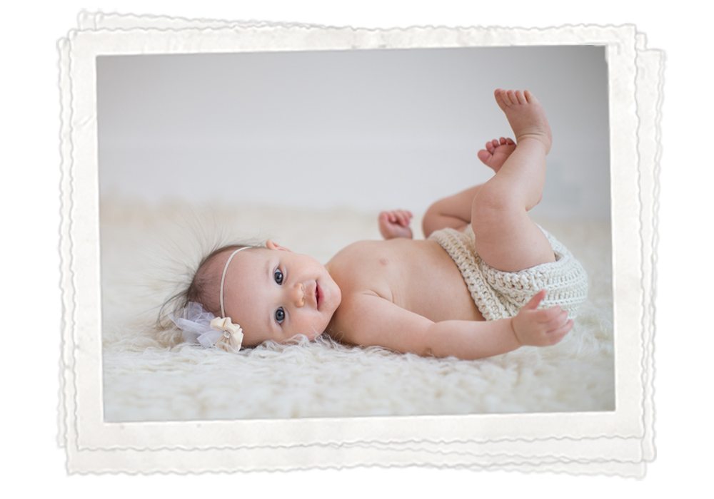 kalamazoo michigan baby photography baby girl natural cream pink studio natural light six months old