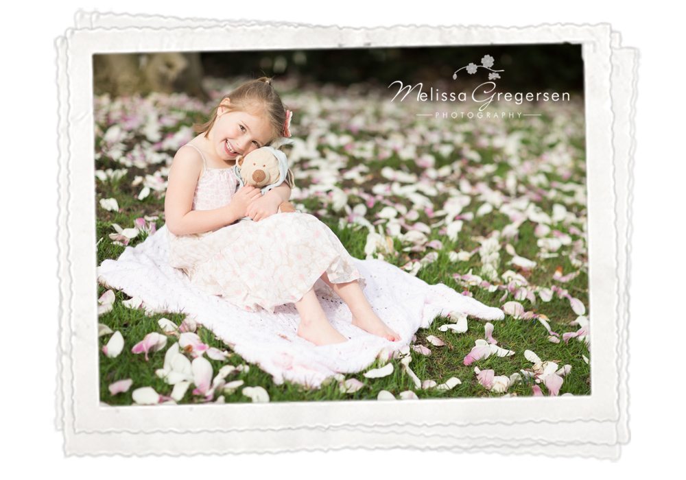 Kalamazoo Michigan Children Photography girl pink spring blossoms nature teddy bear