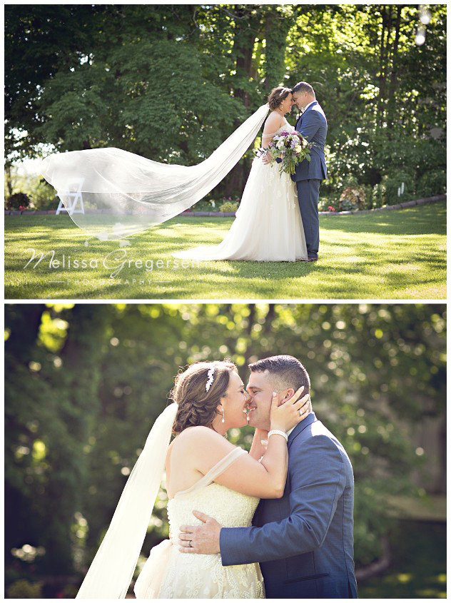 Smiles and kiss from the bride and groom at their Vintage Rose Barn Wedding