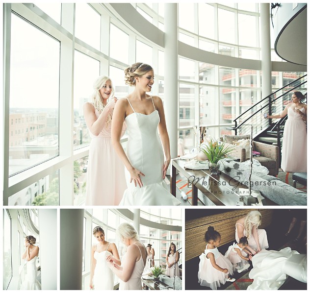 bride getting ready with the help of the brides maids in the Radisson Grand Loft Suite in downtown Kalamazoo