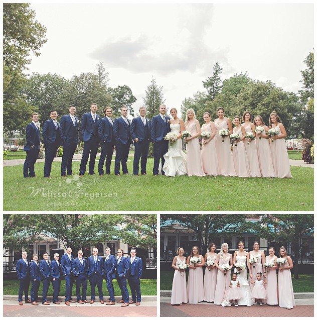 The dark blue suits of the groomsmen and the pale pink of the bridesmaids dresses made for an amazing bridal party portrait.