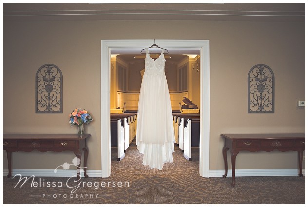 The doorway of the sanctuary was a great spot for this bride's dress picture!