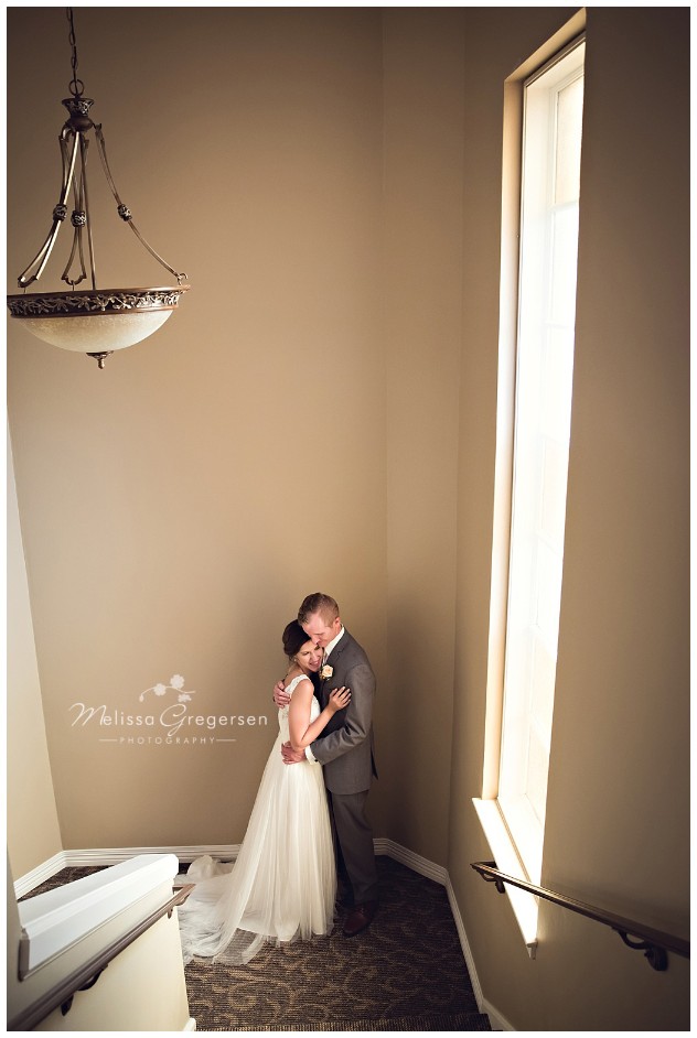 The church had a beautiful stairway for this portrait of the bride and groom.