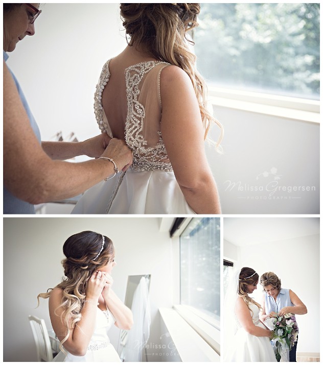 Beautiful bride putting the finishing touches to her look for the big day at the Fetzer Center.